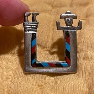 Silver Dancing Man Pin with Red and Blue Accents